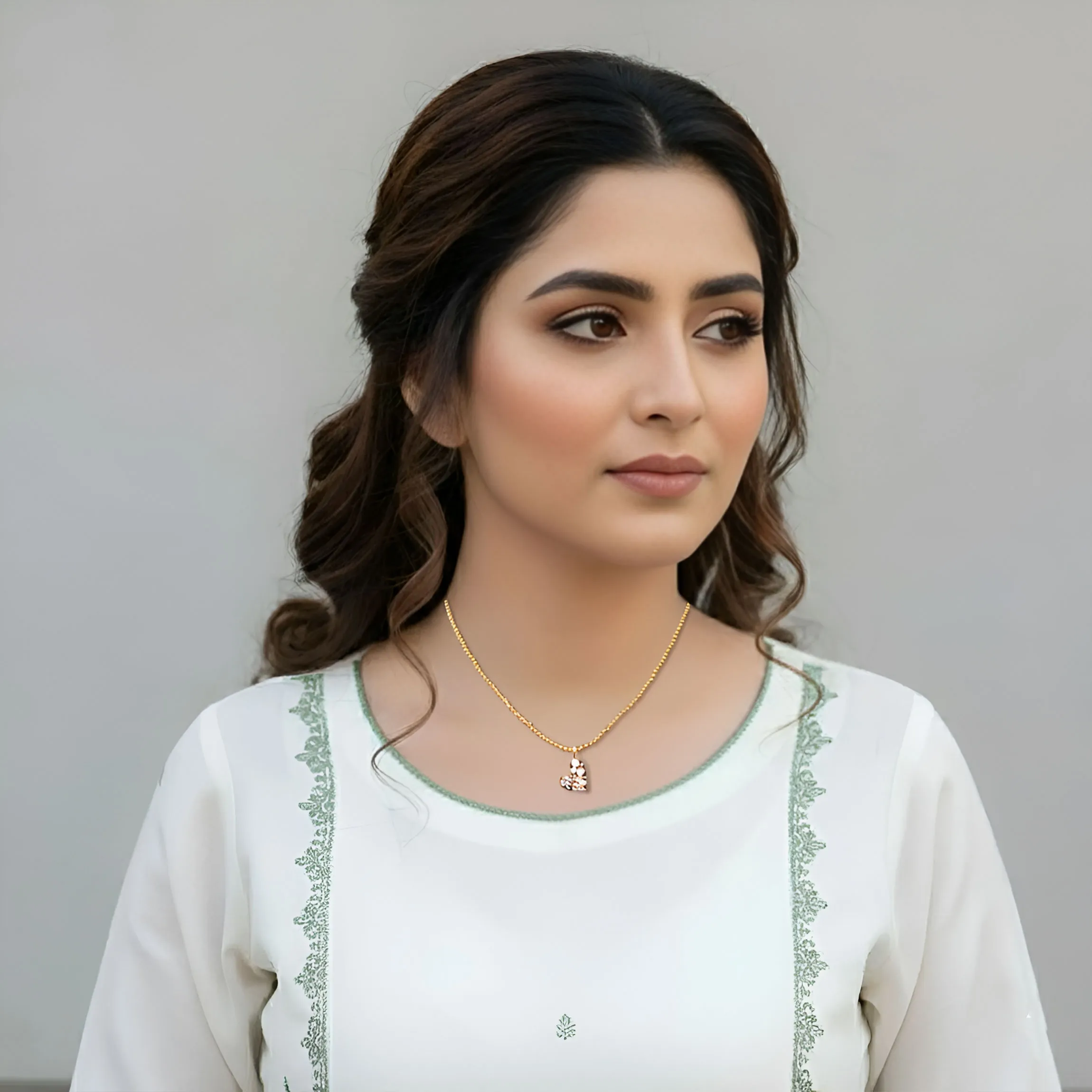 Gold Tone Heart Shaped Pendant Necklace